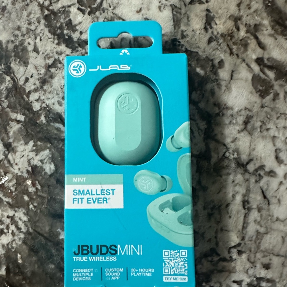 Green Earbud Headphones with Compact Design